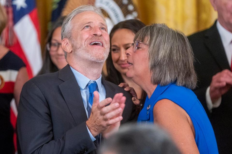 Jon Stewart smiles as the PACT Act is finally signed into law (EPA)