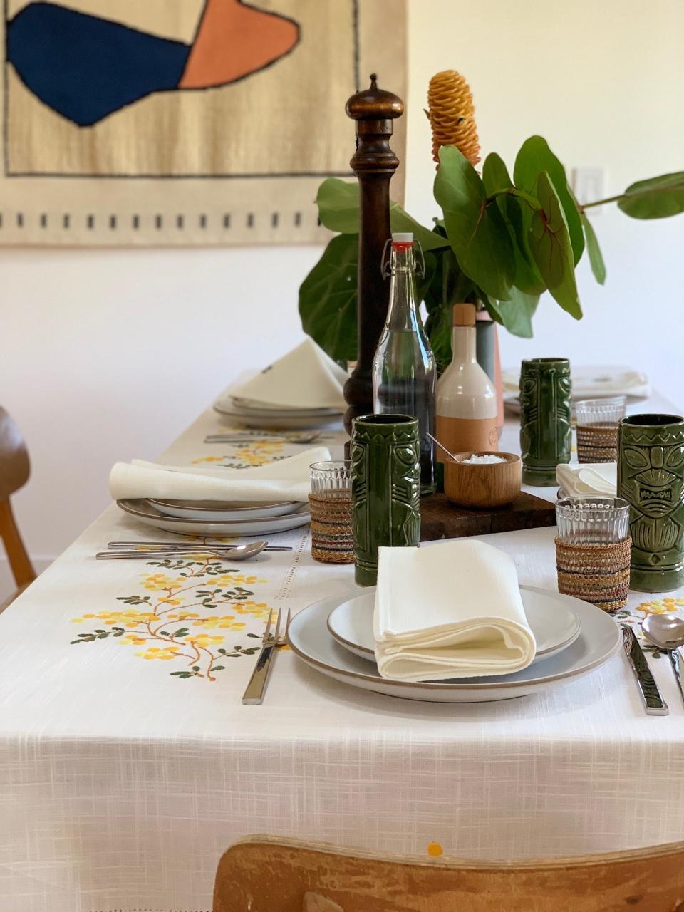 What’s on his table: Heath Ceramics Coupe Line, Alessi Santiago Flatware by David Chipperfield  Vintage glassware, tiki highball, cutting board, pepper mill, handmade table linens from a small linen shop in Rome