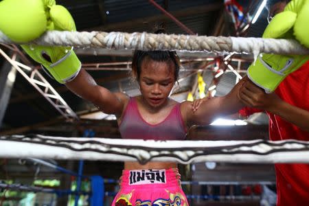 Muay Thai boxer Nong Rose Baan Charoensuk, who is transgender, trains at a gym in Buriram province, Thailand, July 3, 2017. REUTERS/Athit Perawongmetha