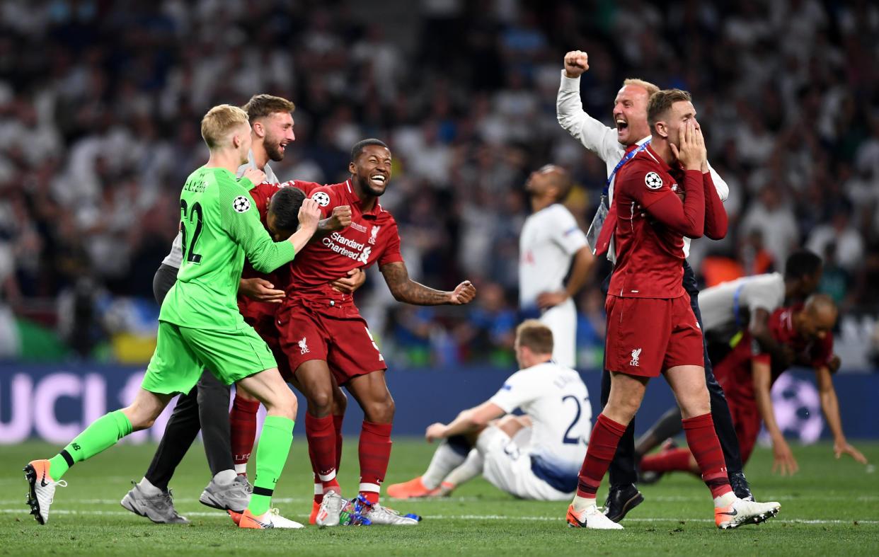 MADRID, SPAIN - JUNE 01: Liverpool players celebrate at full time during the UEFA Champions League Final between Tottenham Hotspur and Liverpool at Estadio Wanda Metropolitano on June 01, 2019 in Madrid, Spain. (Photo by Harriet Lander/Copa/Getty Images)