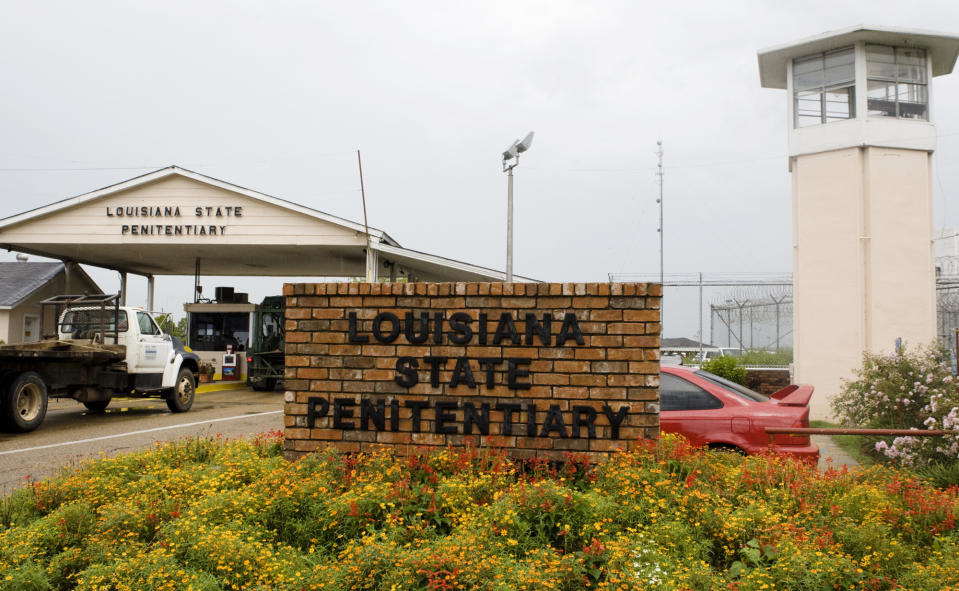 FILE - Vehicles enter at the main security gate at the Louisiana State Penitentiary — the Angola Prison, the largest high-security prison in the country in Angola, La., Aug. 5, 2008. A person found guilty of a sex crime against a child in Louisiana could soon be ordered to undergo surgical castration, in addition to prison time. Louisiana lawmakers gave final approval to a bill Monday, June 3, 2024 that would allow judges the option to sentence someone to surgical castration after the person has been convicted of certain aggravated sex crimes — including rape, incest and molestation — against a child younger than 13. (AP Photo/Judi Bottoni, File)