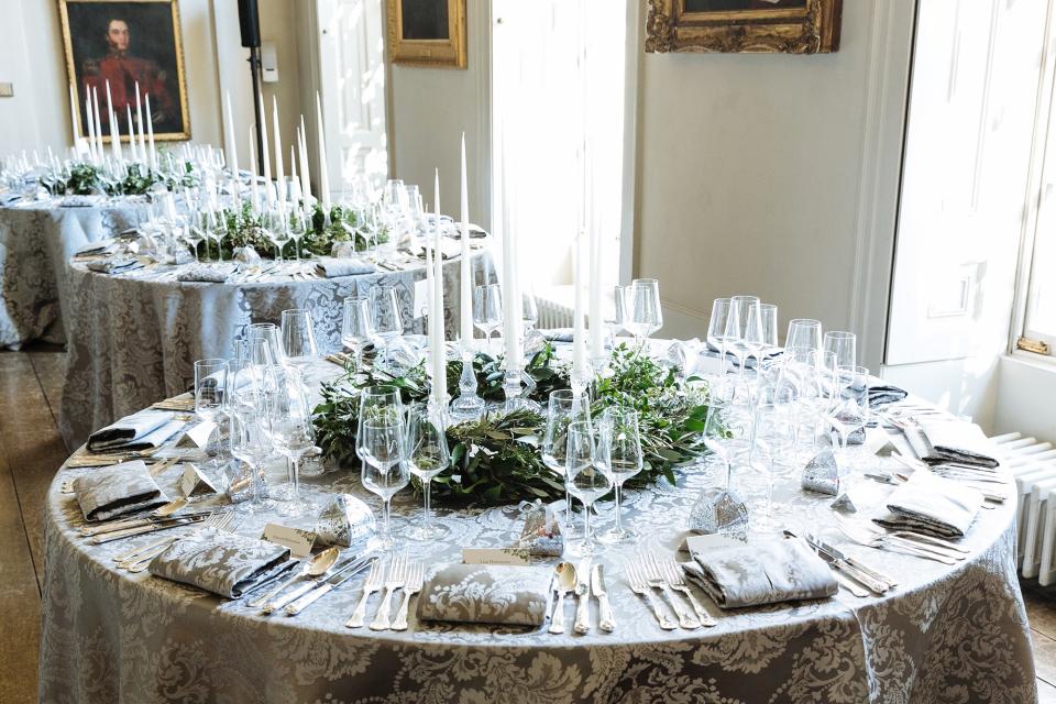I wanted the table settings to be beautiful but simple, and I feel like we really nailed it. The gray brocade felt so decadent, but the simple floral arrangements made it easy for everyone to chat.