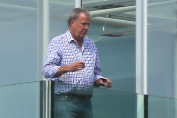 22.AUG.2015 - LONDON - UK*** STRICTLY NOT AVAILABLE FOR MAIL ONLINE AND ANY ONLINE SUBSCRIPTION DEALS UNLESS FEE AGREED PRIOR TO USAGE***** EXCLUSIVE ALLROUND PICTURES ** ** STRICTLY NOT AVAILABLE FOR AUSTRALIA **FORMER TOP GEAR PRESENTER JEREMY CLARKSON SPOTTED WITH A CIGARETTE AND A GLASS OF WINE CHILLING ON HIS BALCONY IN WEST LONDON.  HIS GIRLFRIEND RETURNS HOME WITH ZERO FAT 65P COKE AND TAKES DELIVERY OF AN ORANGE Â£259,000 2016 MCLAREN 750 LONGTAIL.  JEREMY WASN'T PRESENT FOR THE DELIVERYBYLINE MUST READ : XPOSUREPHOTOS.COM***UK CLIENTS - PICTURES CONTAINING CHILDREN PLEASE PIXELATE FACE PRIOR TO PUBLICATION ***UK CLIENTS MUST CALL PRIOR TO TV OR ONLINE USAGE PLEASE TELEPHONE 0208 344 2007**