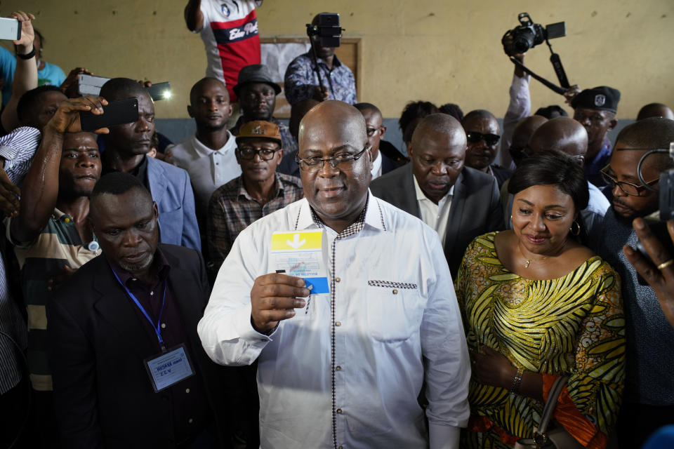 Opposition presidential candidate Felix Tshisekedi casts his ballot in Kinshasa, Sunday Dec. 30, 2018. oSome frty million voters are registered for a presidential race plagued by years of delay and persistent rumours of lack of preparation. (AP Photo/Jerome Delay)