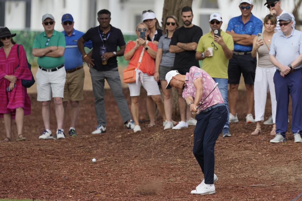 Adrian Meronk of Poland plays his second shot on the second hole during the round two of the DP World Tour Championship golf tournament, in Dubai, United Arab Emirates, Friday, Nov. 17, 2023. (AP Photo/Kamran Jebreili)