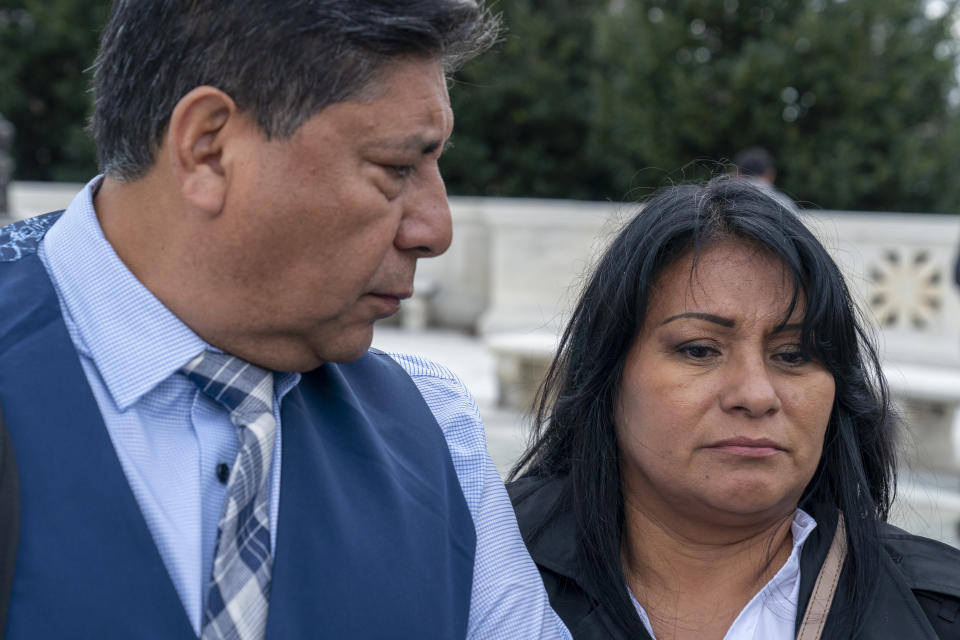 Beatriz Gonzalez, right, the mother of 23-year-old Nohemi Gonzalez, a student killed in the Paris terrorist attacks, and stepfather Jose Hernandez, speak outside the Supreme Court,Tuesday, Feb. 21, 2023, in Washington. A lawsuit against YouTube from the family of Nohemi Gonzalez was argued at the Supreme Court. (AP Photo/Alex Brandon)