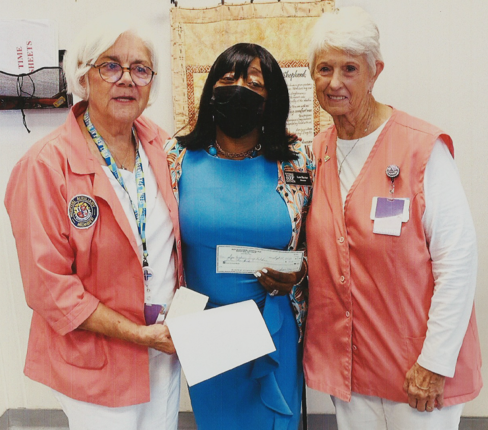 One of the final donations disbursed by the recently disbanded Mary Black Memorial Hospital Auxiliary was to the Spartanburg Soup Kitchen Executive Director Lou Sartor, center. Pictured with her are auxiliary members Toni Macarewicz, left, and Marlene Donna, right.