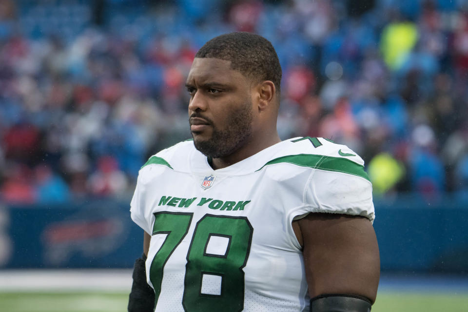 Dec 11, 2022; Orchard Park, New York, USA; New York Jets guard Laken Tomlinson (78) on the sidelines before a game against the <a class="link " href="https://sports.yahoo.com/nfl/teams/buffalo/" data-i13n="sec:content-canvas;subsec:anchor_text;elm:context_link" data-ylk="slk:Buffalo Bills;sec:content-canvas;subsec:anchor_text;elm:context_link;itc:0">Buffalo Bills</a> at Highmark Stadium. Mandatory Credit: Mark Konezny-USA TODAY Sports