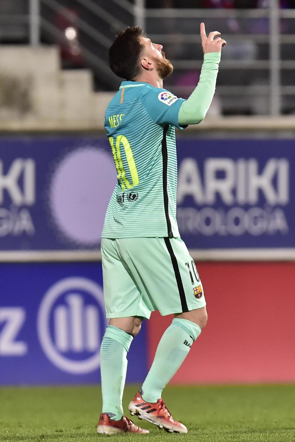 FC Barcelona's Lionel Messi celebrates after scoring against Eibar during the Spanish La Liga soccer match between FC Barcelona and Eibar, at Ipurua stadium in Eibar, northern Spain, Sunday, Jan. 22, 2017. (AP Photo/Alvaro Barrientos)