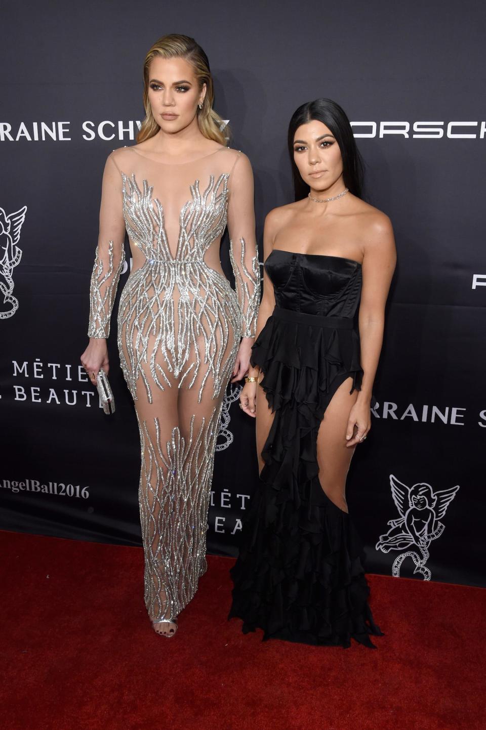 Khloe Kardashian and Kourtney Kardashian attend the November 2016 Angel Ball