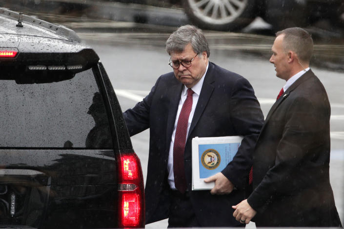 U.S. Attorney General William Barr, left, leaves after a meeting at the West Wing of the White House March 21, 2019, in Washington, D.C.  (Photo: Alex Wong/Getty Images)