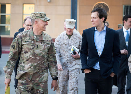 Jared Kushner, Senior Advisor to President Donald J. Trump, speaks with Lt. Gen. Stephen J. Townsend, commander, Combined Joint Task Force – Operation Inherent Resolve, after arriving in Baghdad, Iraq, in this April 3, 2017 handout photo. Navy Petty Officer 2nd Class Dominique A. Pineiro/DoD/Handout via REUTERS