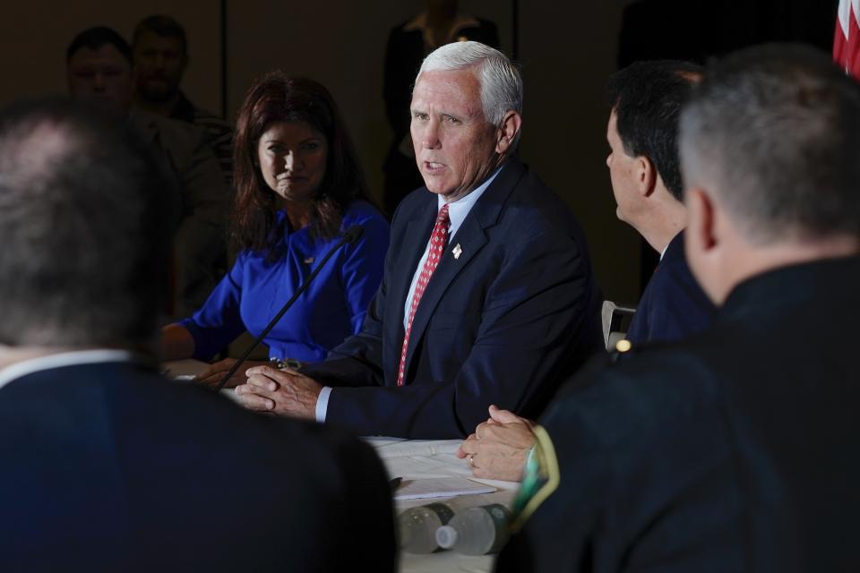 Former Vice President Mike Pence and Wisconsin Rebublican gubernatorial candidate Rebecca Kleefisch participate in a round table discussion Wednesday, Aug. 3, 2022, in Pewaukee, Wis. (AP Photo/Morry Gash)