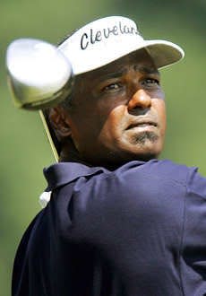 Vijay Singh watches his tee shot on the 11th hole at Firestone Country Club in Akron on Aug. 21, 2021.