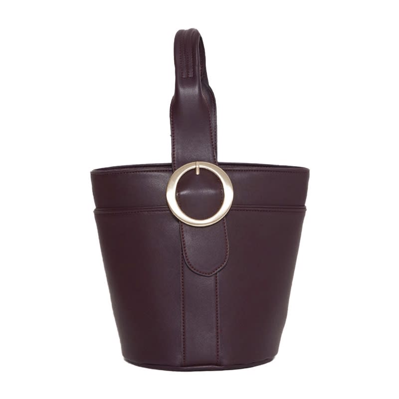 <a rel="nofollow noopener" href="https://thefrankieshop.com/collections/accessories/products/dark-burgundy-bucket-bag" target="_blank" data-ylk="slk:Bucket Bag, The Frankie Shop, $105;elm:context_link;itc:0;sec:content-canvas" class="link ">Bucket Bag, The Frankie Shop, $105</a>