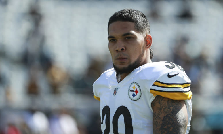 A closeup of James Conner on the football field.