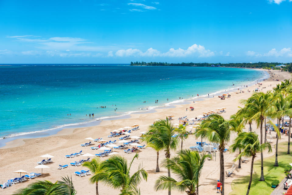 Blue water and beach in San Juan.