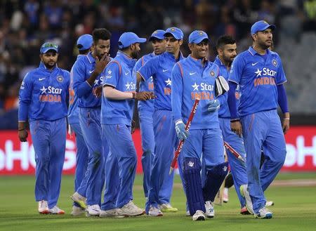 India leave the field after their victory against Australia during their T20 cricket match at the Melbourne Cricket Ground January 29, 2016. REUTERS/Hamish Blair