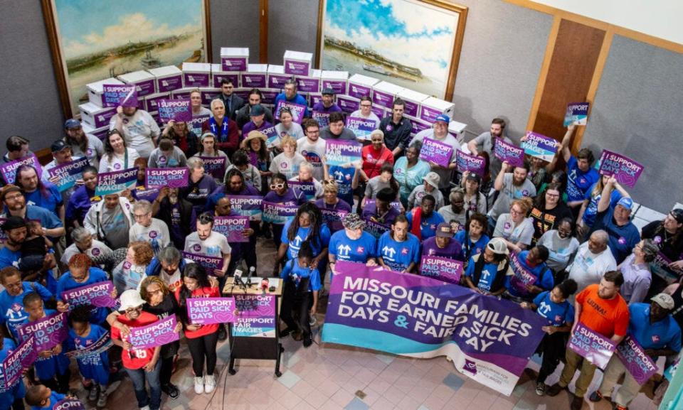 Missourians for Healthy Families and Fair Wages prepares for a press conference about an initiative petition that seeks to raise the state's minimum wage.