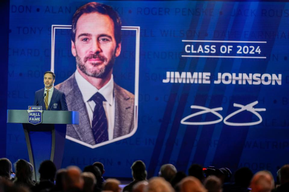 Jimmie Johnson speaks to the crowd during the NASCAR Hall of Fame induction ceremony.