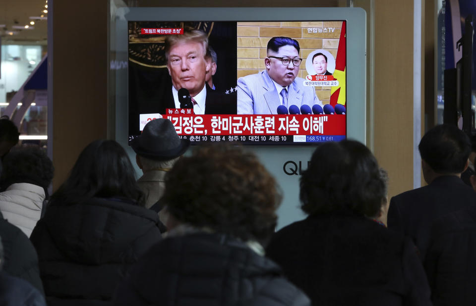 People watch a TV screen showing North Korean leader Kim Jong Un and U.S. President Trump, left, at the Seoul Railway Station in Seoul, South Korea, on March 9, 2018. (Photo: Ahn Young-joon/AP)