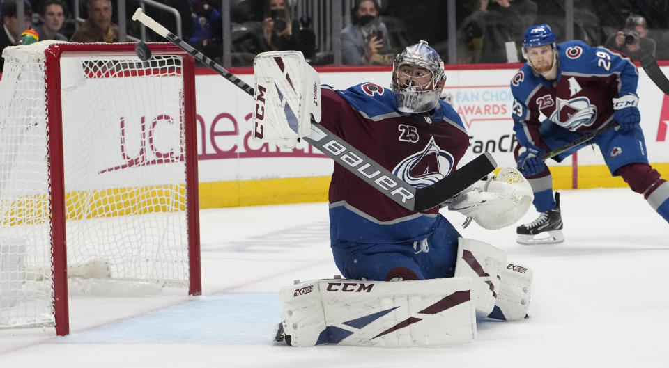 FILE - Colorado Avalanche goaltender Philipp Grubauer (31) watches the puck in the first period of Game 5 of an NHL hockey Stanley Cup second-round playoff series in Denver, in this Tuesday, June 8, 2021, file photo. Several goaltenders were on the move in NHL free agency Wednesday, July 28, 2021. Vezina Trophy finalist Philipp Grubauer left Colorado for the expansion Seattle Kraken. (AP Photo/David Zalubowski, File)