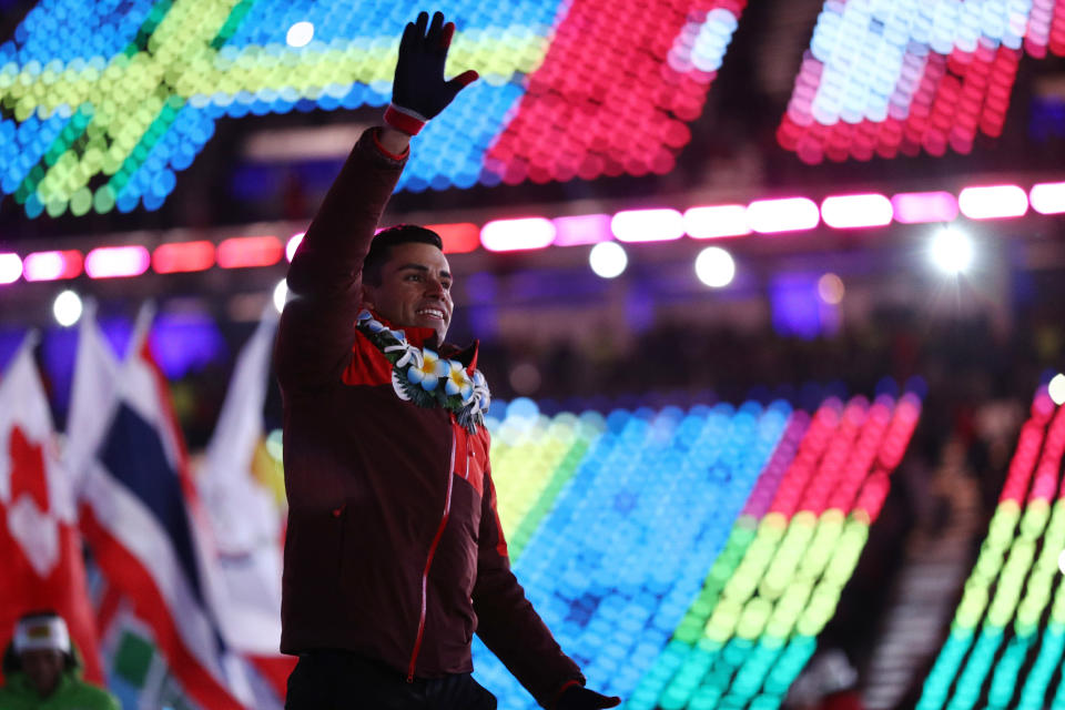 At first, Taufatofua appeared in a heavy coat...&nbsp; (Photo: Maddie Meyer via Getty Images)