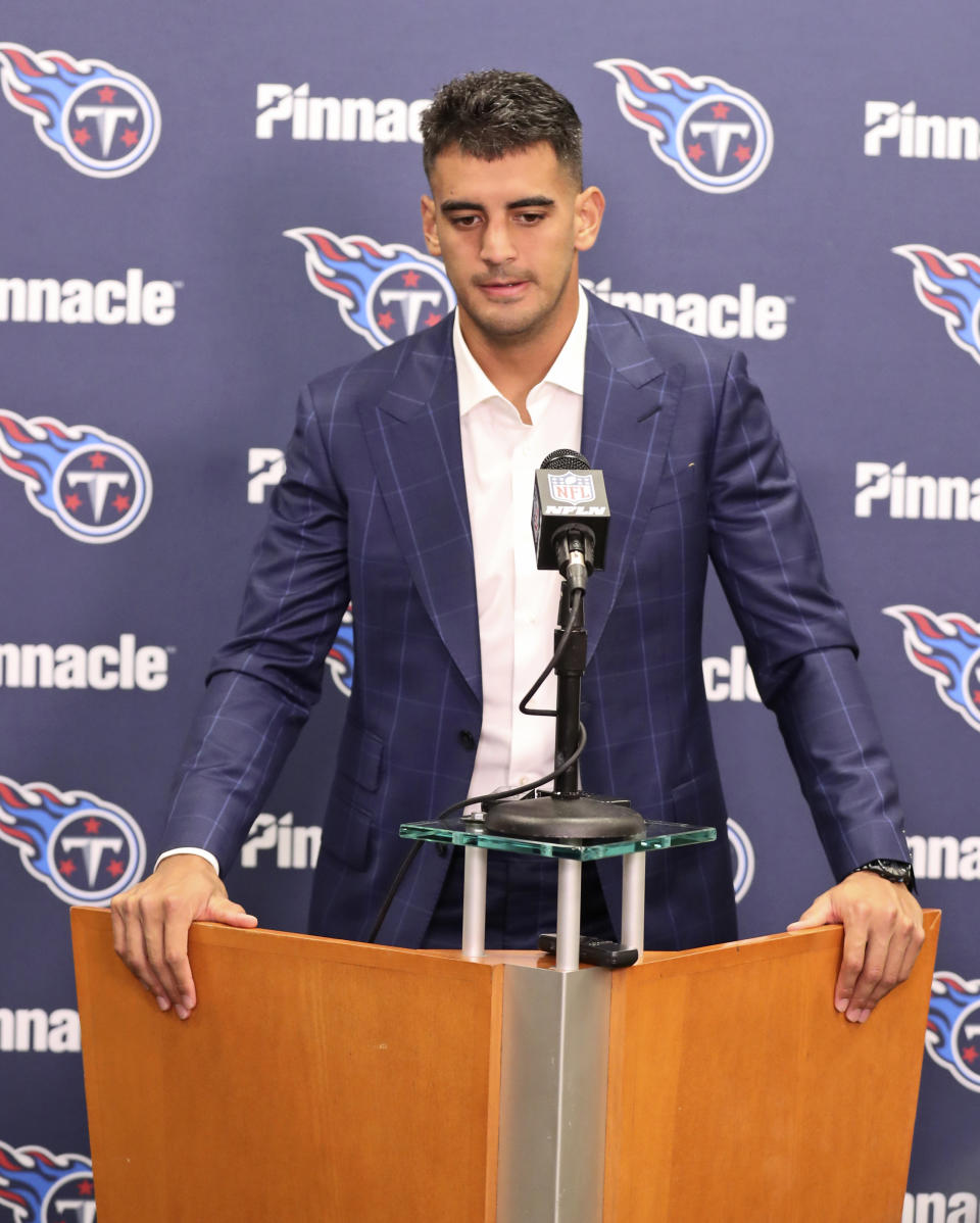 Tennessee Titans quarterback Marcus Mariota answers questions after the team defeated the Cleveland Browns in an NFL football game Sunday, Sept. 8, 2019, in Cleveland. (AP Photo/Ron Schwane)