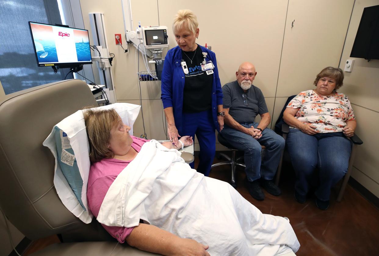 RN Jo Richardson attends to Pam Jeffries who was getting her second round of Leanemab, for patients being treated for early onset Alzheimer’s on Friday, September 8, 2023. Her brother, Mark Carter and her sister-in-law Linda Carter were visiting.

This is the FIRST FDA-approved Alzheimer's drug. Lecanemab slows the progress of Alzheimer’s disease by dissolving plaques that can build up between brain cells, or neurons, and are widely thought to cause Alzheimer’s symptoms. More technically, it is a monoclonal antibody targeting beta-amyloid.