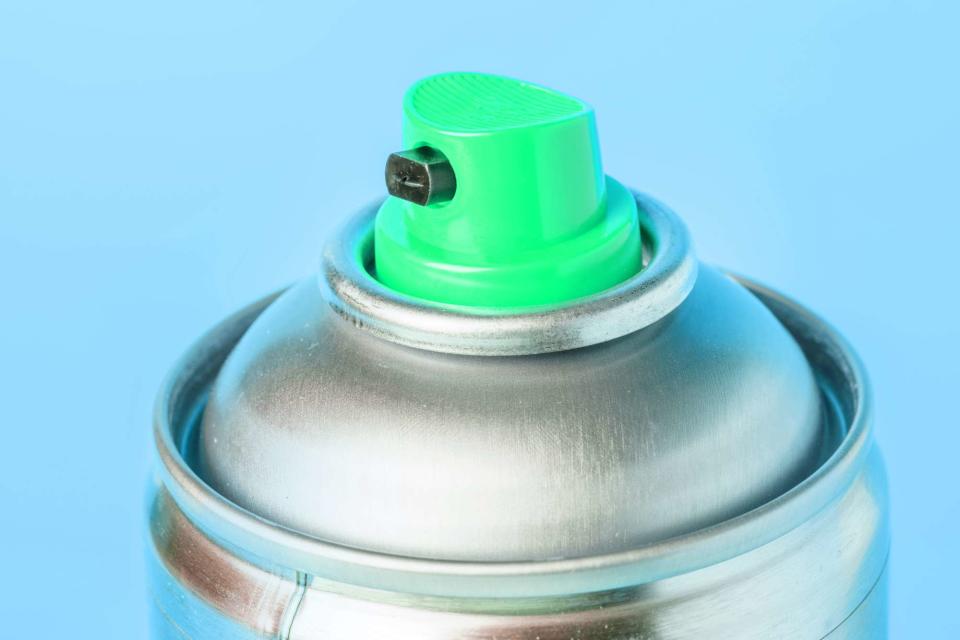<p>Getty</p> Stock image of the top of an aerosol spray can