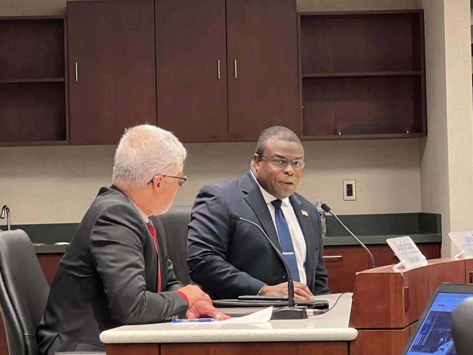 John Gibbs sits at the Ottawa County Board of Commissioners table Tuesday, Jan. 3, 2023, after being named the county's new administrator.