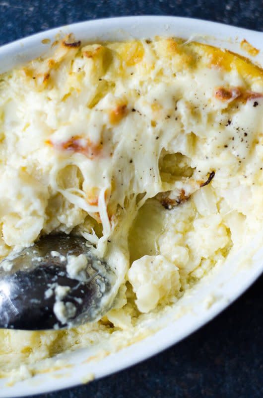 <p>Give Recipe</p><p>So good it'll have everyone eating their veggies. </p><p><strong>Get the recipe: <a href="https://www.giverecipe.com/cheesy-cauliflower-casserole/" rel="nofollow noopener" target="_blank" data-ylk="slk:Cheesy Cauliflower Casserole;elm:context_link;itc:0;sec:content-canvas" class="link ">Cheesy Cauliflower Casserole</a> </strong></p><p><strong>Related: <a href="https://parade.com/1319283/parade/cauliflower-recipes/" rel="nofollow noopener" target="_blank" data-ylk="slk:51 Best Cauliflower Recipes and Delicious Dish Ideas;elm:context_link;itc:0;sec:content-canvas" class="link ">51 Best Cauliflower Recipes and Delicious Dish Ideas</a></strong></p>