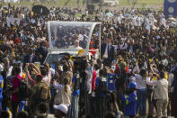 Pope Francis on the popemobile arrives at Ndolo airport where he will preside over the Holy Mass in Kinshasa, Congo, Wednesday Feb. 1, 2023. Francis is in Congo and South Sudan for a six-day trip, hoping to bring comfort and encouragement to two countries that have been riven by poverty, conflicts and what he calls a "colonialist mentality" that has exploited Africa for centuries. (AP Photo/Gregorio Borgia)