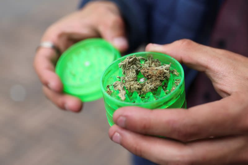 People demonstrate in front of the Colombian Congress, in favor of the regulation of marijuana for adult use in Bogota