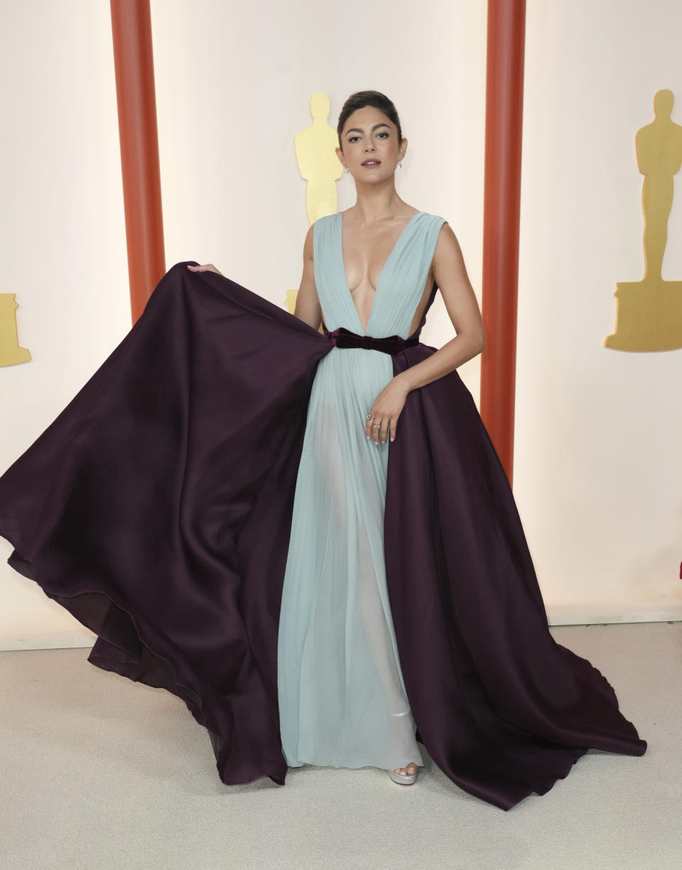 Monica Barbaro arrives at the Oscars on Sunday, March 12, 2023, at the Dolby Theatre in Los Angeles. (Photo by Jordan Strauss/Invision/AP)