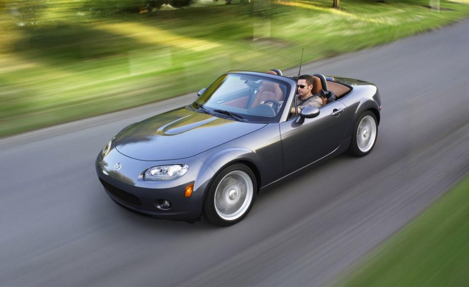 <p>Meet the NC MX-5, which at first doesn't officially carry the "Miata" name. That is corrected in due time. Meanwhile, the NC takes a decisive leap into modernity with an all-new unibody and running gear. It grows larger and slightly heavier in the process, which Mazda offsets with a new 2.0-liter inline-four with 170 horsepower-only 8 ponies shy of the previous year's turbocharged engine in the now-dead Mazdaspeed version. </p>