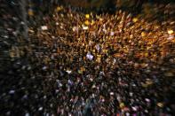 Israelis protest against the government's response to the financial fallout of the coronavirus disease (COVID- 19) crisis at Rabin square in Tel Aviv