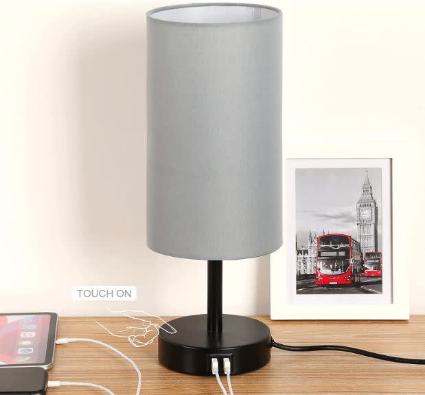 This  bedside lamp turns on with a finger tap and comes with USB ports to charge your phone