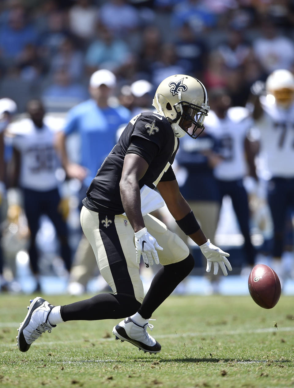 New Orleans Saints quarterback Teddy Bridgewater fumbles during the first half of a preseason NFL football game against the Los Angeles Chargers, Sunday, Aug. 18, 2019, in Carson, Calif. (AP Photo/Kelvin Kuo )