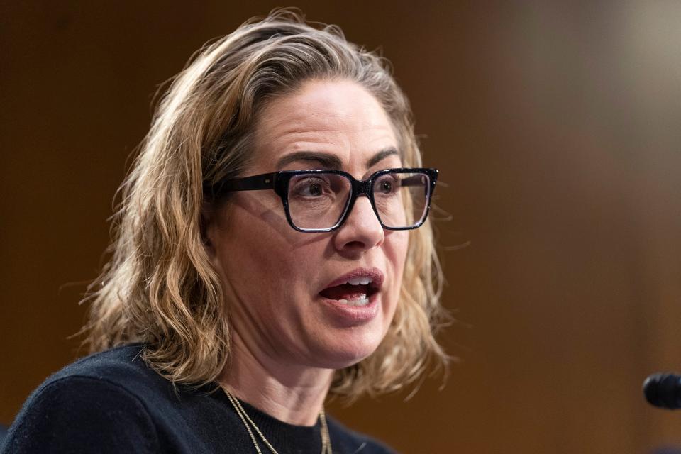 U.S. Sen. Kyrsten Sinema, I-Ariz., questions Defense Secretary Lloyd Austin testifying before a Senate Appropriations Committee hearing to examine the national security supplemental request, on Capitol Hill in Washington, Tuesday, Oct. 31, 2023.