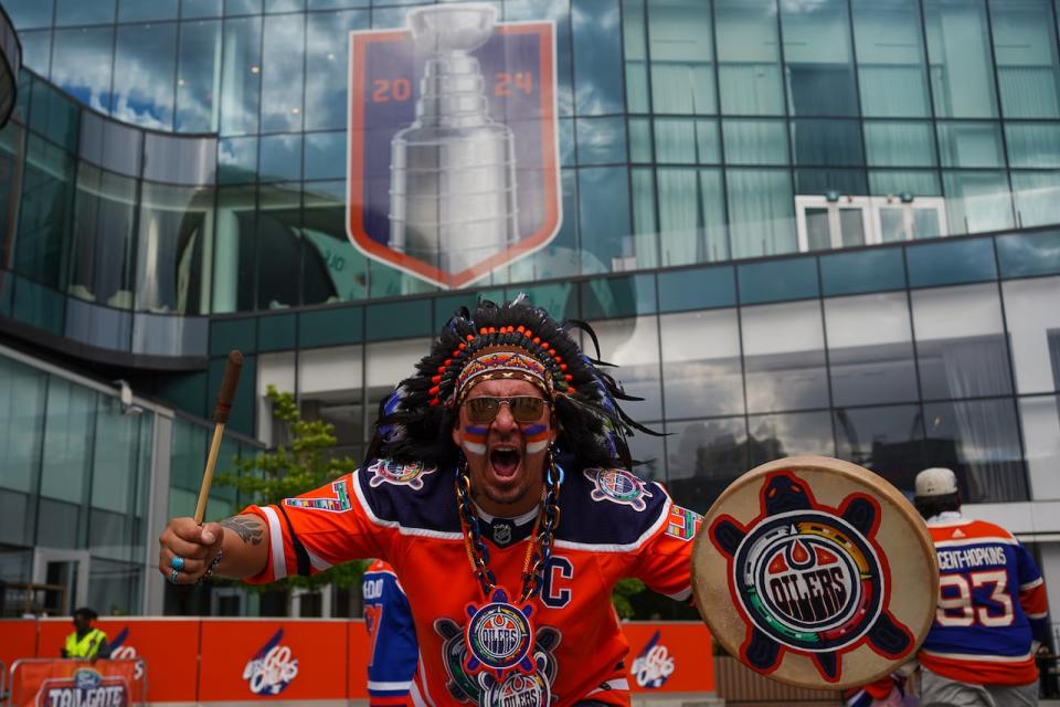 Edmonton Oilers fan LJ Muskwa poses for a photo in the Edmonton Ice District before Game 6 between the Edmonton Oilers and Florida Panthers on Friday, June 21, 2024. 