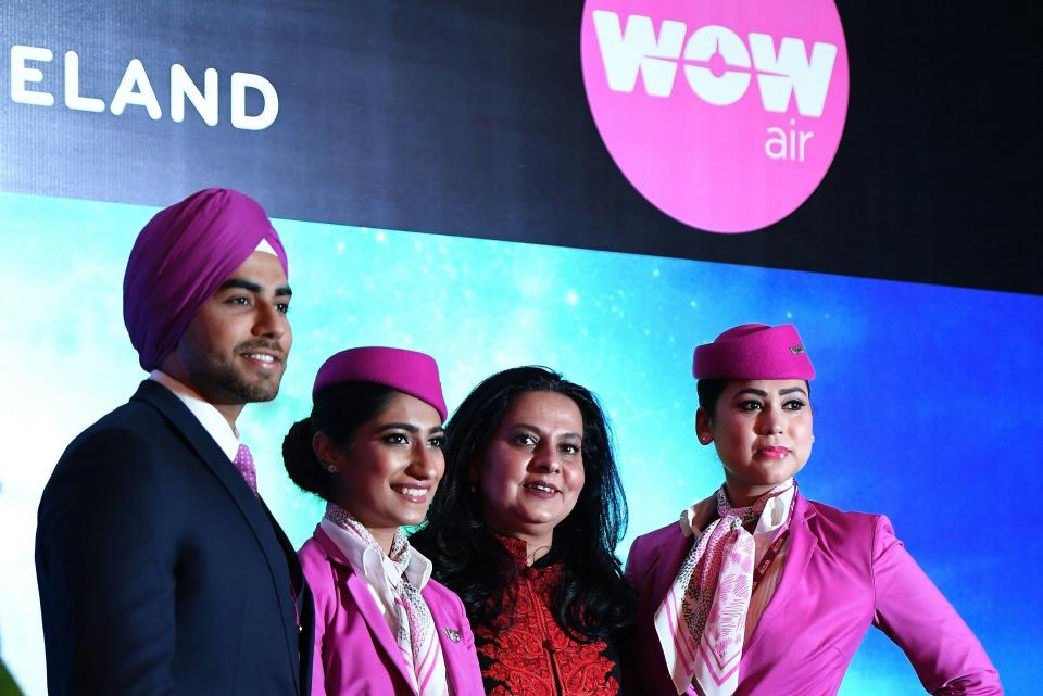 WOW Air Managing Director Kiran Jain (2R) poses with airline crew members during a press conference following Wow Air’s inaugural flight in New Delhi on December 7, 2018. Photo: PRAKASH SINGH/AFP/Getty Images