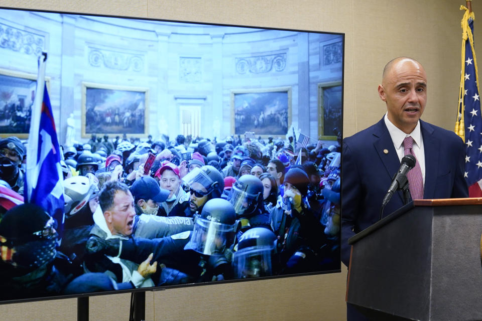 U.S. Attorney for the District of Colombia Matthew Graves speaks about the unfolding of the January 6 attack on the Capitol during a presentation ahead of this year's third anniversary in Washington, Thursday, Jan. 4, 2024. (AP Photo/Susan Walsh)