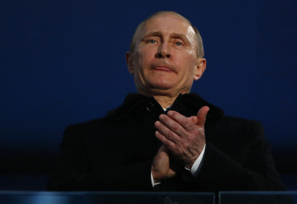 Russian President Vladimir Putin attends the opening ceremony of the 2014 Winter Paralympics at the Fisht Olympic stadium in Sochi, Russia, Friday, March 7, 2014. (AP Photo/Dmitry Lovetsky)