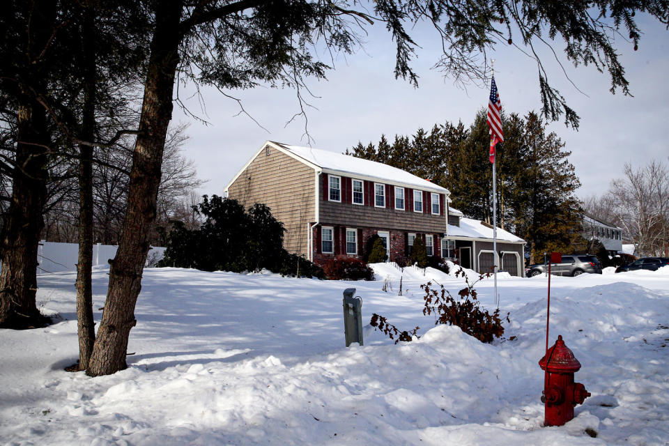 A snow-covered house. (Craig F. Walker/Boston Globe via Getty Images file)