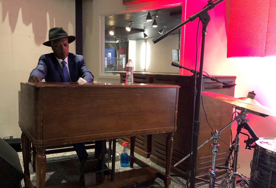 Master keyboardist Booker T. Jones prepares a Hammond B3 organ before a performance at the Stax Museum of American Soul Music on Wednesday, Sept. 14, 2022, in Memphis, Tenn. (AP Photo/Adrian Sainz)