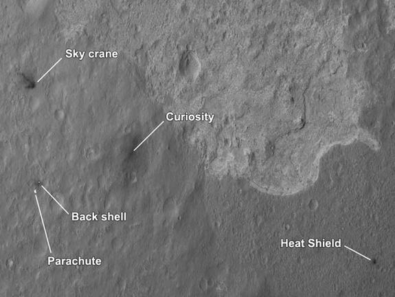 NASA's Curiosity rover and its landing sky crane, parachute and other hardware are seen by the Mars Reconnaissance Orbiter in this image released Aug. 7, 2012. Curiosity landed on Aug. 5 PDT.