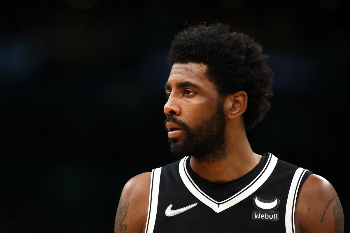 Kyrie Irving exercises player option to remain with Nets next season