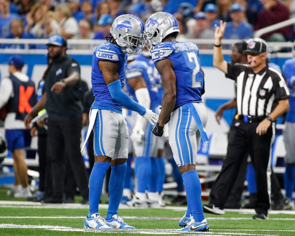 Detroit Lions cornerback Cam Sutton (1) and safety C.J. Gardner-Johnson (2) celebrate a play against the Seattle Seahawks during the first half at Ford Field in Detroit on Sunday, Sept. 17, 2023.