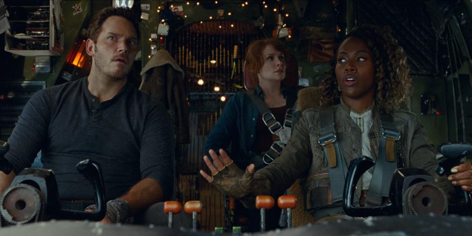 Owen Grady (Chris Pratt, left), Claire Dearing (Bryce Dallas Howard) and Kayla Watts (DeWanda Wise) try to survive a plane ride from hell in "Jurassic World: Dominion."